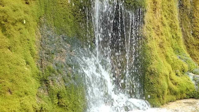 Travertine waterfall Dreinmuehlen (engl. three mills) at Nohn in  Vulkan Eifel region (Germany)