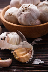 fragrant garlic on a wooden rustic background