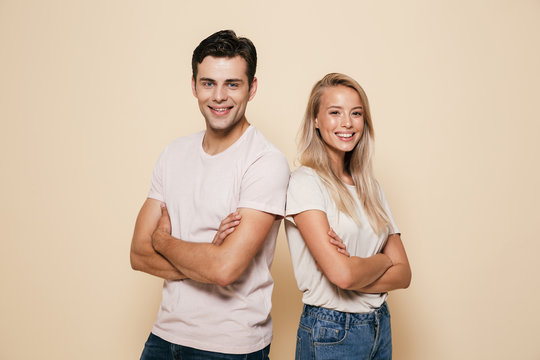 Portrait of a smiling young couple standing
