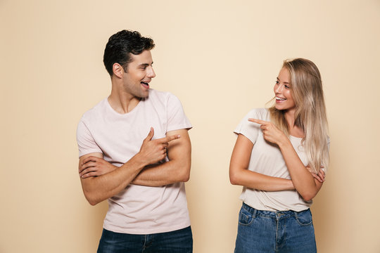 Portrait of a smiling young couple standing together