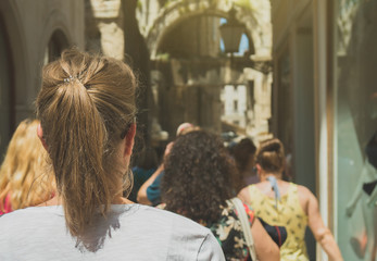 Many tourists walk around the old town of Split.