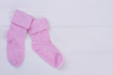 Light pink cotton wool socks with copyspace.