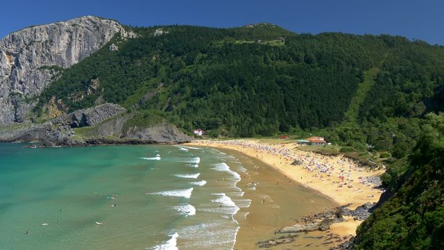 Beautiful white sand beach Playa de Laga. North coast of Spain, Basque Country. 4K, UHD