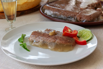  piece of jelly and a glass of vodka