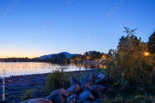 Beautiful Magog Town At Night In Reflections Of Memphremagog