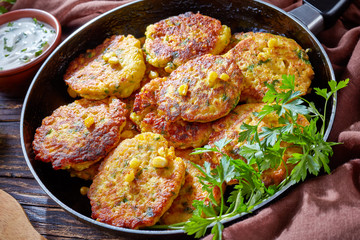 hot corn fritters in a skillet