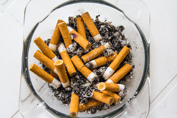 Ashtray full of cigarettes