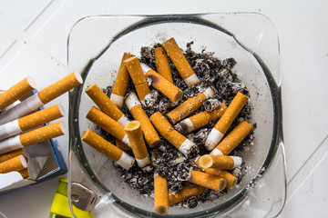 Ashtray full of cigarettes