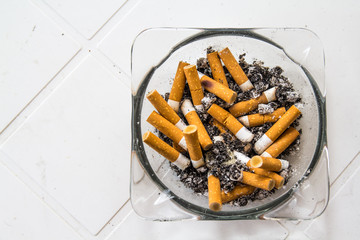 Ashtray full of cigarettes