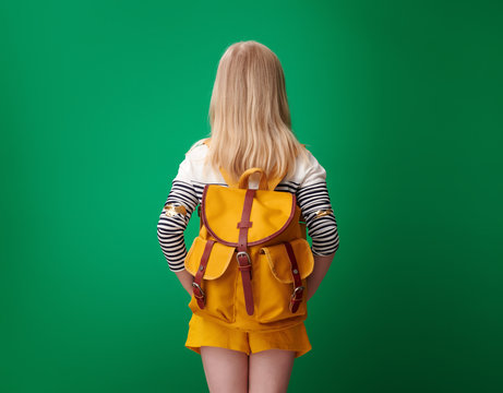 Seen From Behind Pupil With Backpack Against Green Background