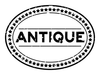 Fototapeta premium Grunge black antique word oval rubber seal stamp on white background
