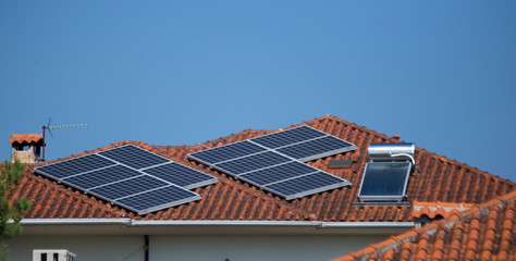 photovoltaic solar panels on a roof of a house