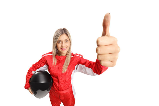 Female racer making a thumb up sign