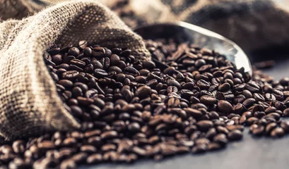 Fotobehang Close-up fresh roasted coffee beans in bag © weyo