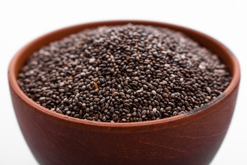 chia seeds on a white acrylic background
