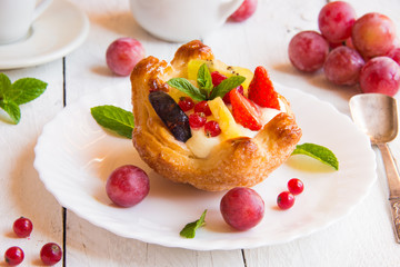 Delicious dessert with cream and fruit