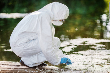 biologist working on water analysis. Ecology and environmental pollution concept.