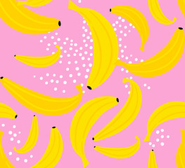 Seamless pattern with yellow bananas on the pink. Bananas on the pink background with  white dots. Vector fruit summer pattern with bananas. Simple repeated background perfect for fabric, kids goods