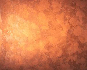 Brown background with a rough surface with a slight vignetting and toning. View from above.