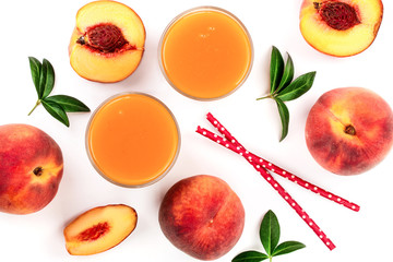 peach juice with leaves isolated on white background. Top view. Flat lay pattern