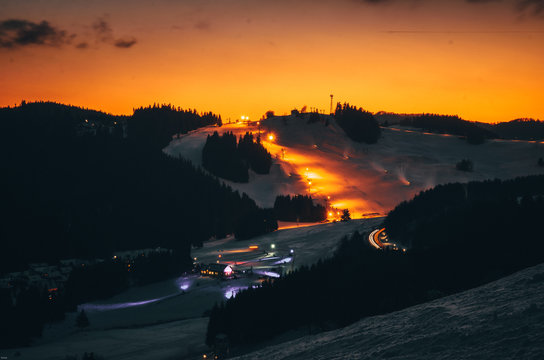 Sunset sky in night ski resort - winter photo, edit space