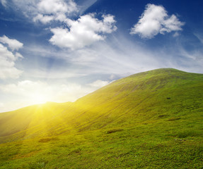 Mountain landscape on sun