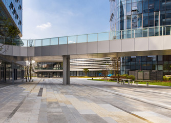 buildings with empty concrete square floor