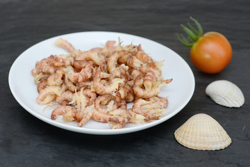north sea crabs in the bowl on black slate