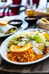 Enchilada with tomato rice, a mexican recipe