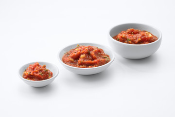 close up view of salsa hot spicy meixan sauce on white back