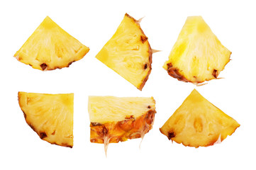 Set of pineapple slices on a white background