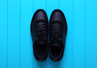 Men's sport shoes оn wood