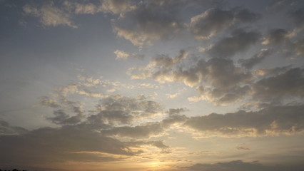 Naklejka na ściany i meble Sunset on clouds