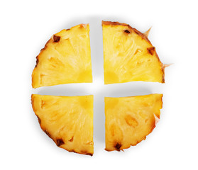 Four slices of pineapple on a white background