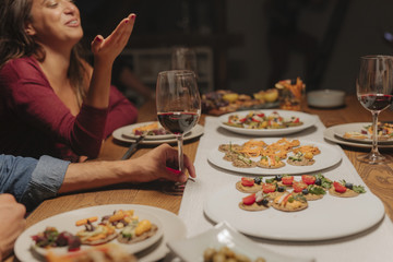 Friends Enjoying at Dinner Party