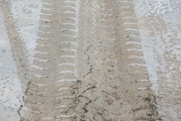Wheel car track on wet cement concrete floor for background
