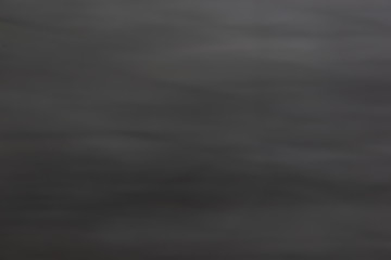 Abstract blurred dark grey background texture. Blank space for design