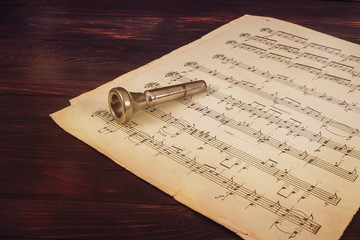the notes and the mouthpiece from woodwind instruments