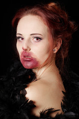 female vampire or zombie portrayed as a glamorous vamp
