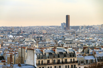 Naklejka premium Beautiful Paris afternoon cityscape seen from Montmartre with the tour Montparnasse skyscraper