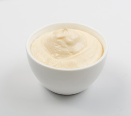 Olive Mayonnaise or Mayo Sauce in Small White Bowl Close Up