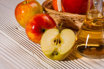 apple vinegar on a wooden rustic background
