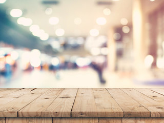 Empty wooden table and abstract blurred image background display montage for product.