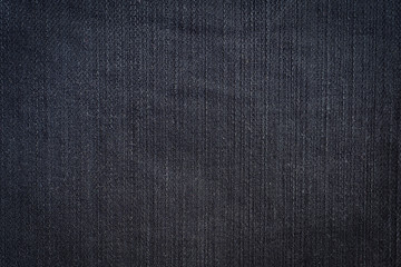 Fototapeta na wymiar close up black jeans denim texture and background