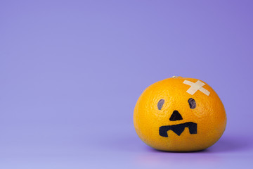  Fresh Oranges with Halloween Pumpkins painted face. Easy DIY decoration for Halloween festival