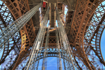 Beautiful view of the Eiffel tower seen from beneath in Paris