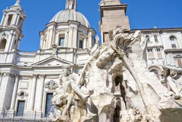 Fototapeta na wymiar The Fountain of the four rivers in the middle of Piazza Navona - Rome Italy