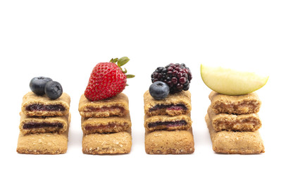 Various Flavors of Whole Grain Breakfast Bars on a White Background