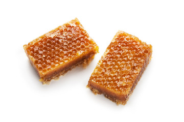 Tasty sweet cut honeycombs isolated on white