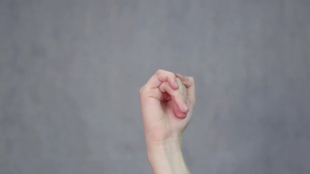 Woman hand gesturing jointed movements. Gesture, sign, symbol. Communication with no talking concept.
